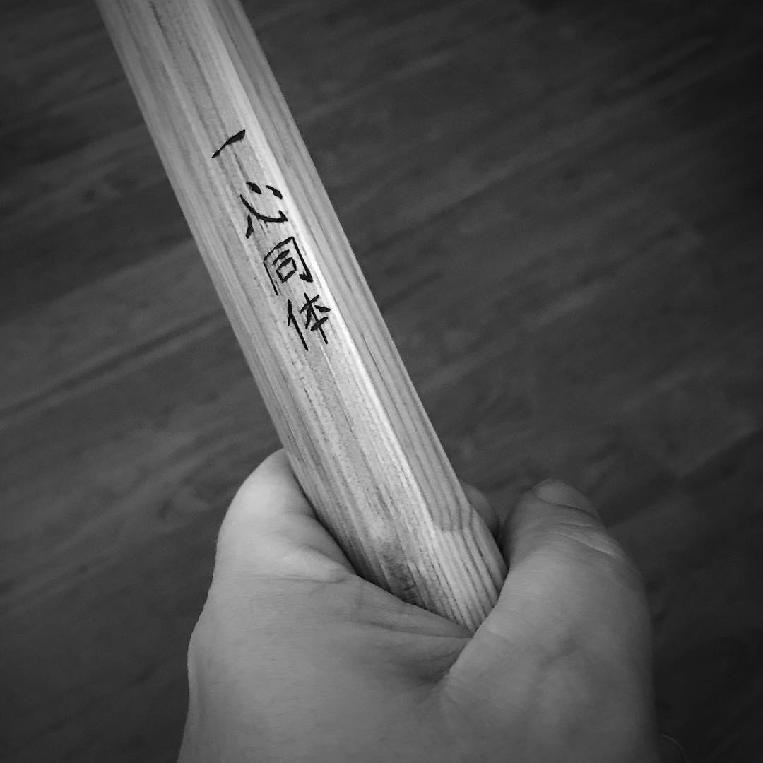 Isshin Dotai – one in #body and #spirit. After the kids went to bed, I got some more #training time with my #bokken and then finished off the night with some #meditation  The isshin dotai inscription is on the back of the bokken’s blade. #karate #kobudo #martialarts #innerpeace #innerstrength #bushido #soulofjapan