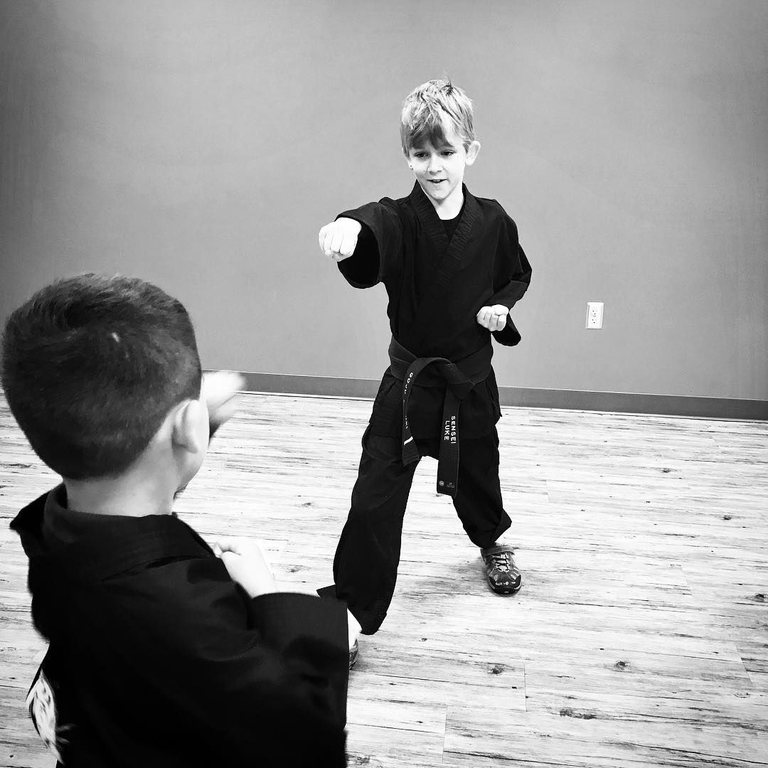 My #junior #blackbelt son helping teach a young #whitebelt – a #happy moment for this #prouddad  #karate #bushido #martialarts #dojo #goju #shorei #family #training #strength #character #student #mindfulness #naperville #illinois
