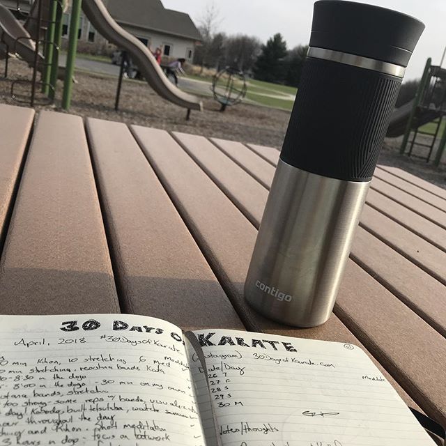 Day 26 of #30daysofmartialarts  Starting tonight with some #journal writing (okay, “catching up”) at my daughter’s soccer practice. I wonder why, if there’s a coffee mug in the picture, that I’m using the hashtag #bourbon 🤔  And tonight is the @karatecombat card! Live stream at 8:30 Central… #inceptionmiami #martialarts #karate #30daysofkarate @mish.mash.do @jeremylesniak @erickastengren @ando_mierzwa @karateculture @bsma_dojo @scottbolon